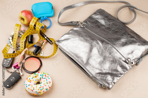 Women's silver handbag and its contents