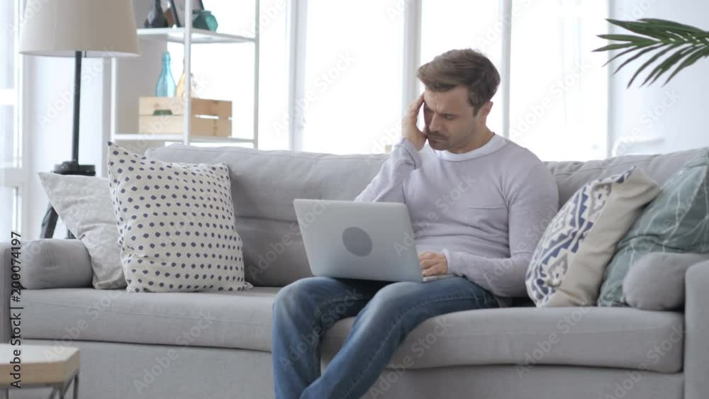 Man Working on Laptop with Headache, Pain in Head Man Working on Laptop with Headache, Pain in Head