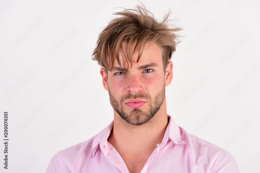 Macho expresses confidence. Man with serious face isolated on white Macho expresses confidence. Man with serious face isolated on white