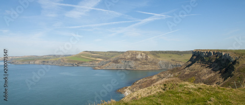 Afternoon spring sunshine over Jurassic Coast from St Albans or Adhelms Head, Purbeck, Dorset, UK