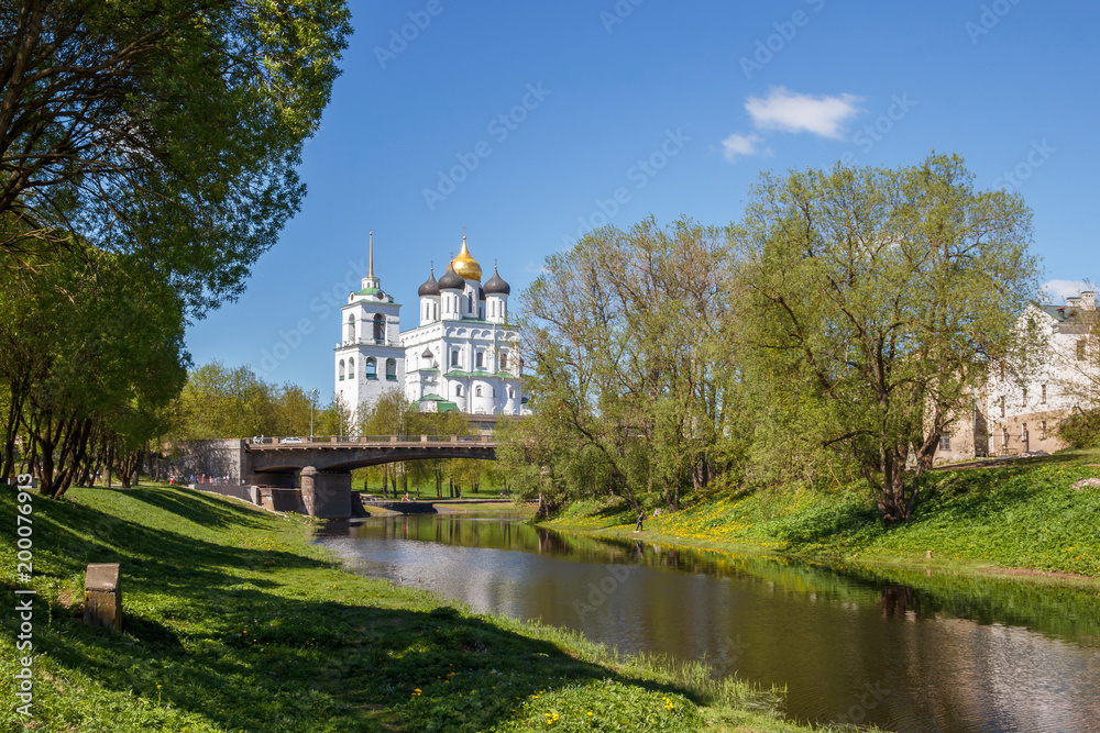 Fototapeta premium River Pskov, bridge, Trinity Cathedral in Pskov