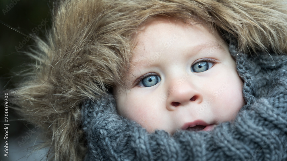 Young boy in warm clothes Young boy in warm clothes