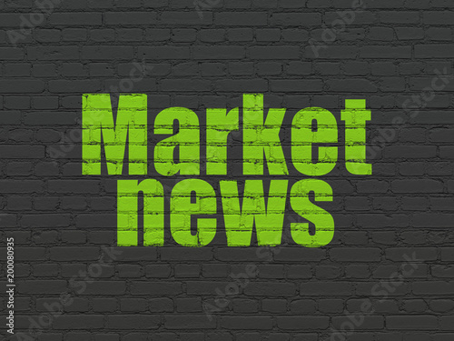 News concept: Painted green text Market News on Black Brick wall background © Maksim Kabakou
