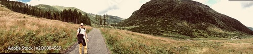 Young man in the mountains photo