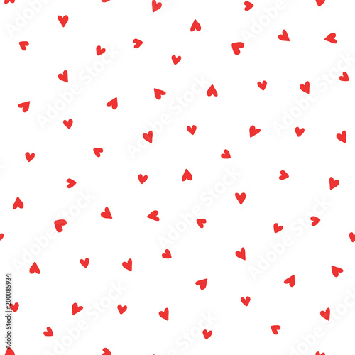 Hand drawn seamless vector pattern with red hearts on a white background. Design concept for Valentines day, kids textile print, wallpaper, wrapping paper.