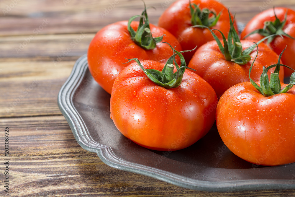 Tasty red ripe tomatoes gourmato from Belgium close up, ingredients for healthy salad close up Tasty red ripe tomatoes gourmato from Belgium close up, ingredients for healthy salad close up