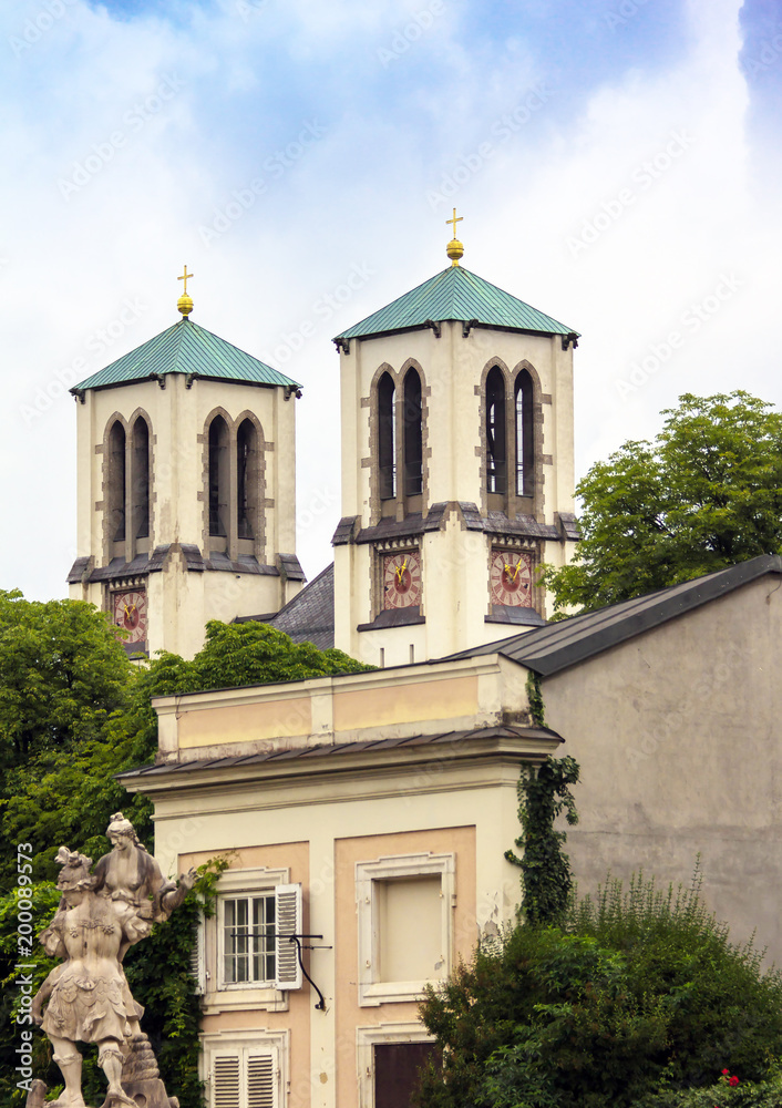 Salzburg, Austria. Church of Holy Andrew, Mirabell palace and Mirabell garden with sculpture 