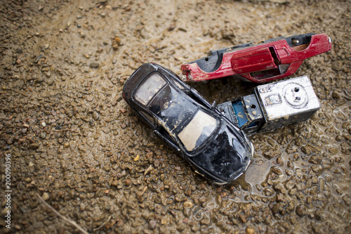 children's cars in sand accident © Igorzvencom