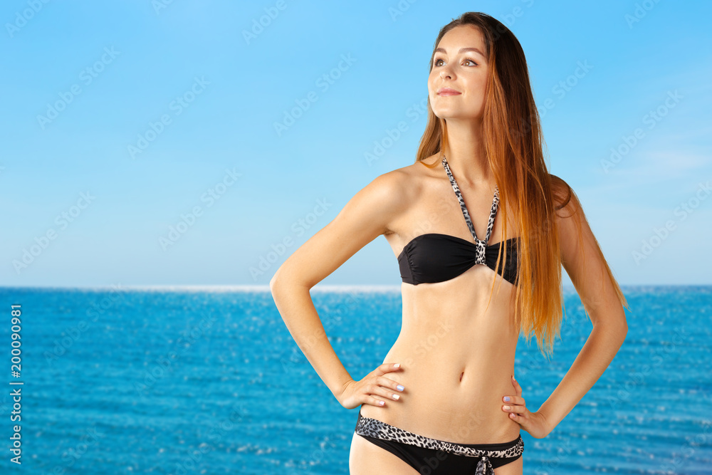 Young attractive woman in swimsuit