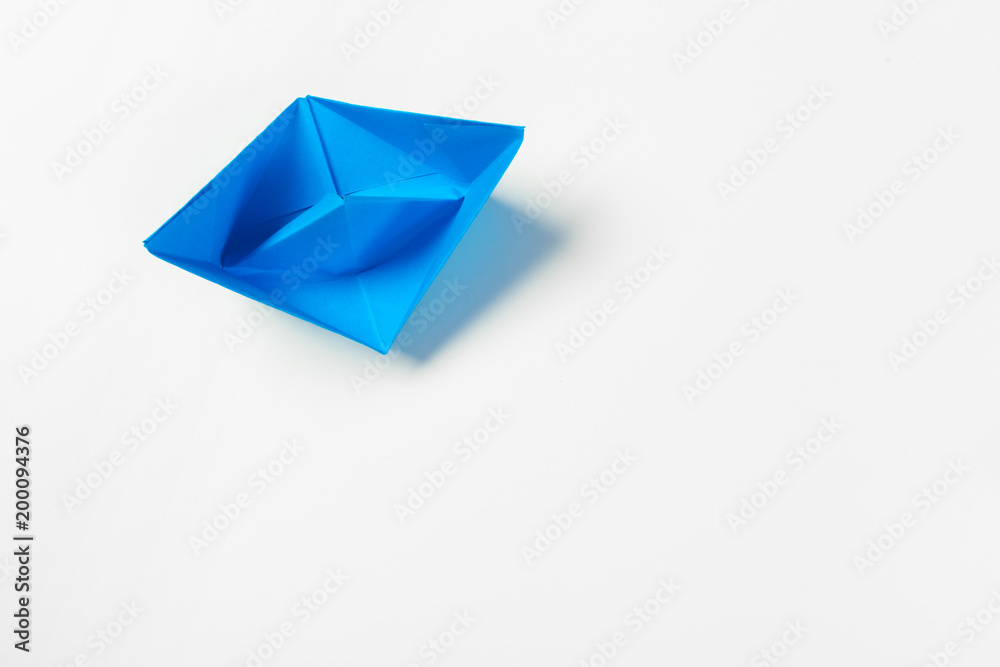 origami paper boat isolated on white background origami paper boat isolated on white background