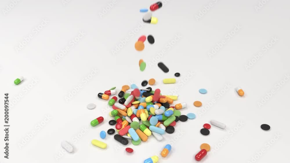 Pile of colorful medicine pills falling on table Pile of colorful medicine pills falling on table