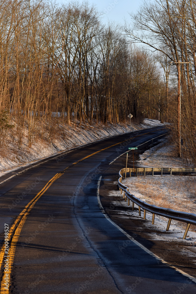 Fototapeta premium Empty country road in winter. 