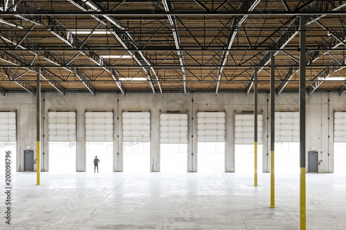 Owner standing in loading dock door