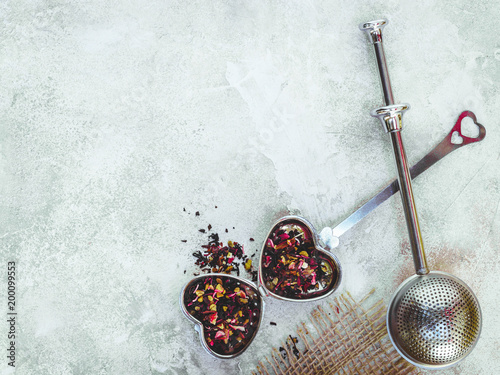 Tablou pe pânză Metal tea infuser with leaves