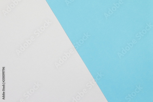 Two color paper with blue and white Overlap on the floor And split half of the image. background