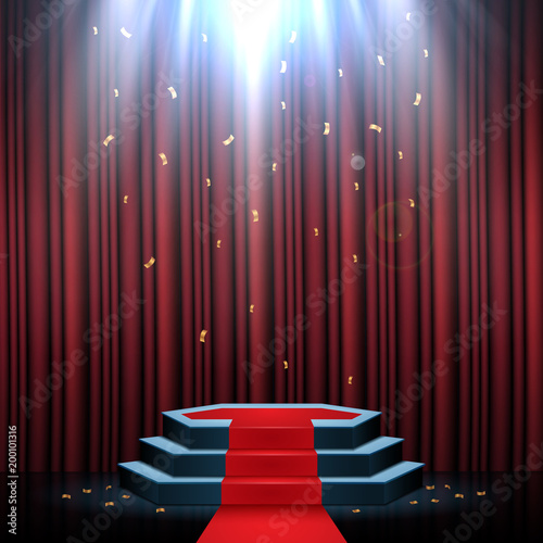 Podium with red carpet and curtain illuminated by spotlights