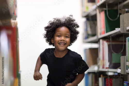 Happy kids lifestyle in the Library. Young people explore lifestyle in the Library. Development of Human Resources in Education Concept. Setup studio shooting.
