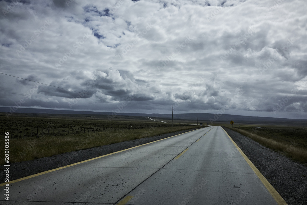 Fototapeta premium Rural Road and Overcast Sky in Patagonia