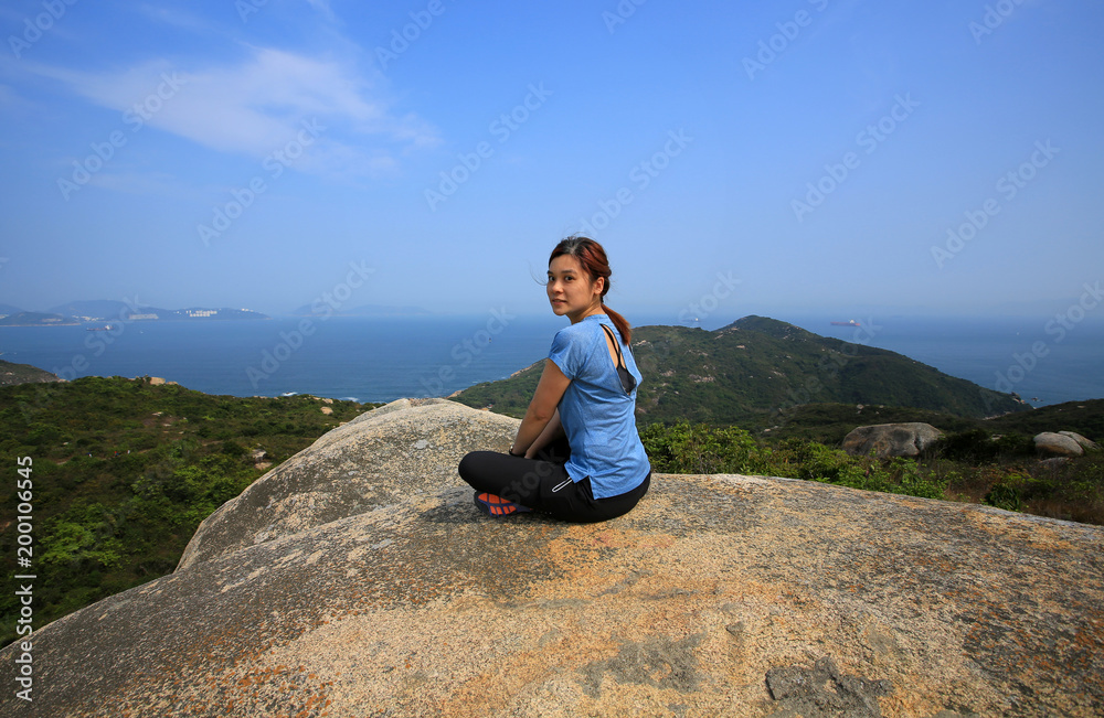 girl watching beautiful peak view