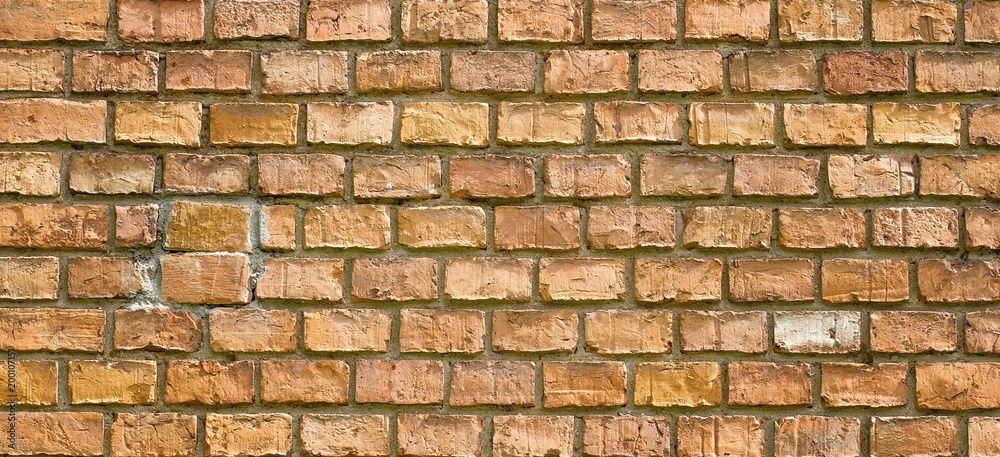 Fototapeta premium Old vintage red brick wall fragment banner background texture