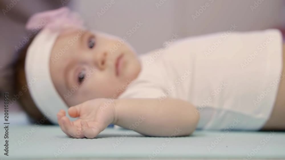 close up. newborn hand in the foreground in focus and background portrait close up. newborn hand in the foreground in focus and background portrait