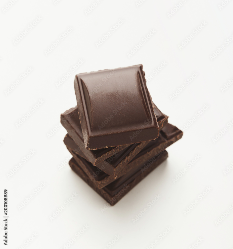 Bar of dark chocolate isolated on white Bar of dark chocolate isolated on white