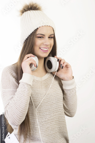 A young girl with headphones