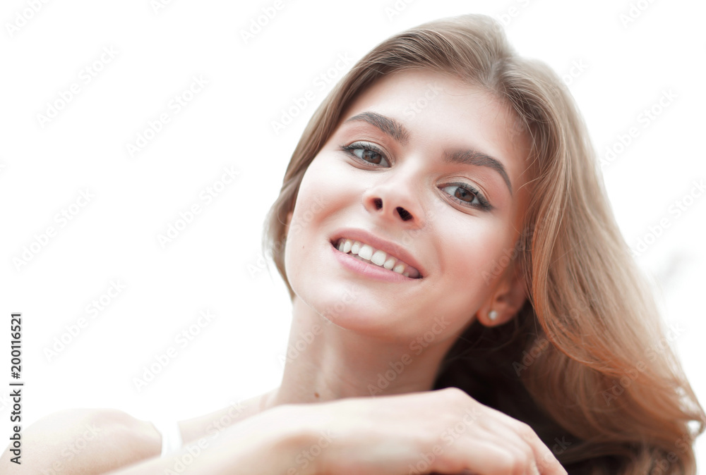 closeup portrait of a smiling young woman with light make-up closeup portrait of a smiling young woman with light make-up