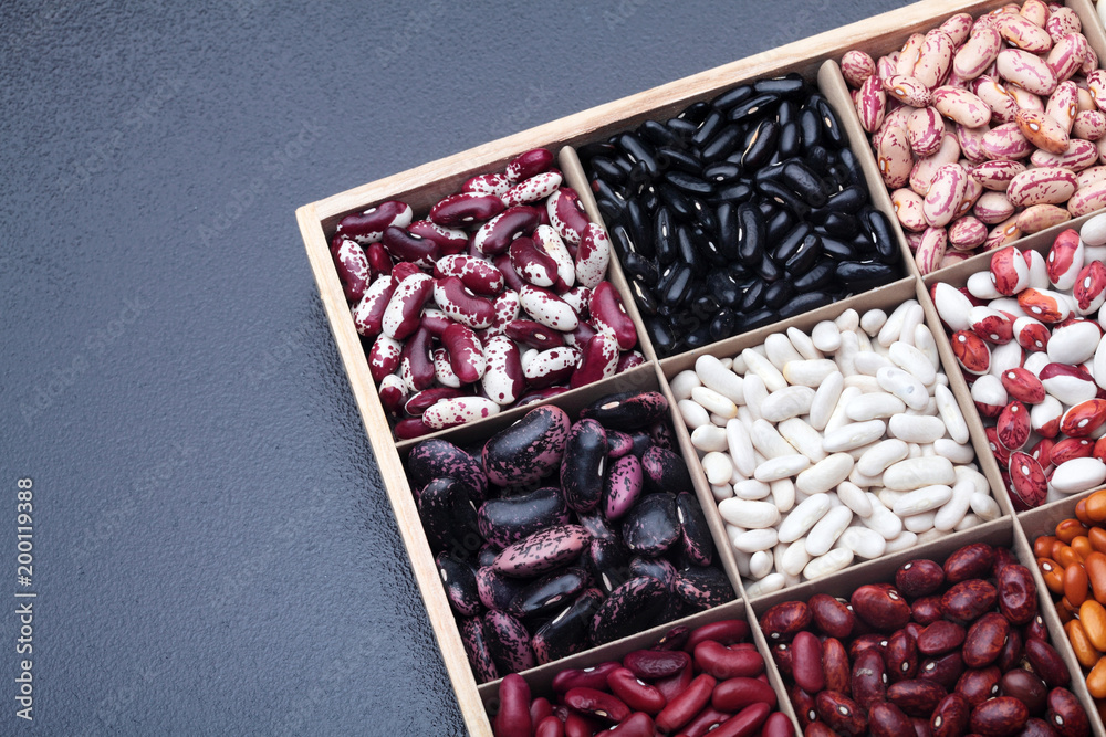 Different types of legumes beans. In wooden box.Varieties of beans.Top ...