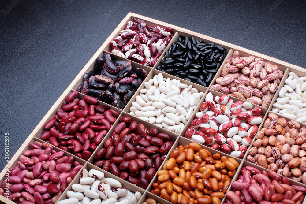 Different types of legumes beans. In wooden box.Varieties of beans.Top ...