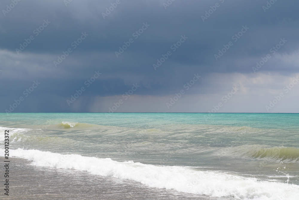 Beach on the Mediterranean in a cloudy day
