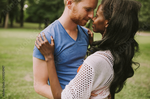 Multiracial couple in the park