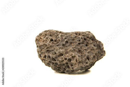 Volcanic stone with holes isolated on a white background