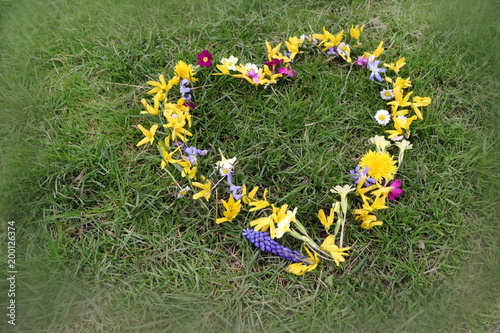 Floral heart on grass