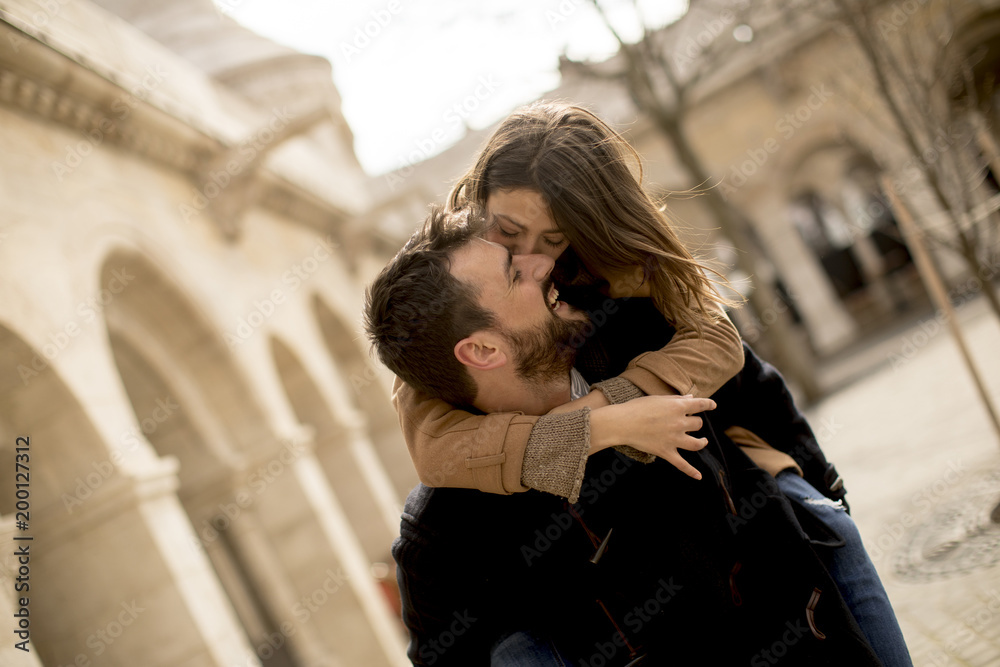 Fototapeta premium Loving couple walking and having fun in Budapest, Hungary