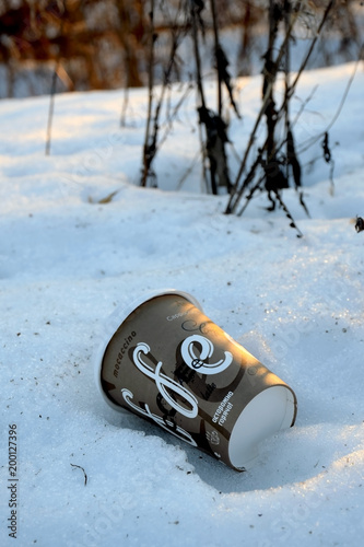 the threat to the environment begins with an abandoned Cup of coffee