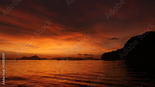 Sunset time lapse at beach of El Nido, Palawan, Philipinnes photo