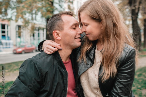 Nice outdorr portrait of young beautiful couple in love photo