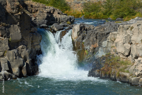 Waterfall at White River Falls canyon view in Eastern Oregon USA Pacific Northwest.