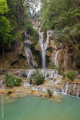 Fototapeta Naklejka Na Ścianę i Meble -  Beautiful view of the main fall at the Tat Kuang Si Waterfalls near Luang Prabang in Laos.