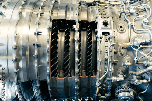 The pipes and mechanical systems of an aircraft jet engine. Would make a great steam punk background.