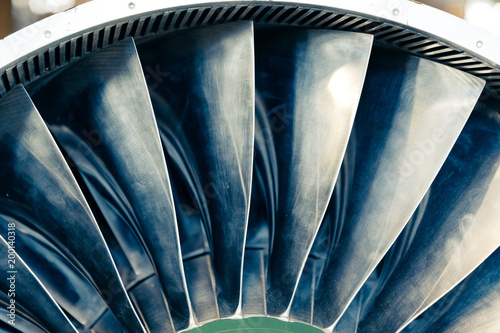 Turbine blades of turbo jet engine for plane, aircraft concept in aviation industry