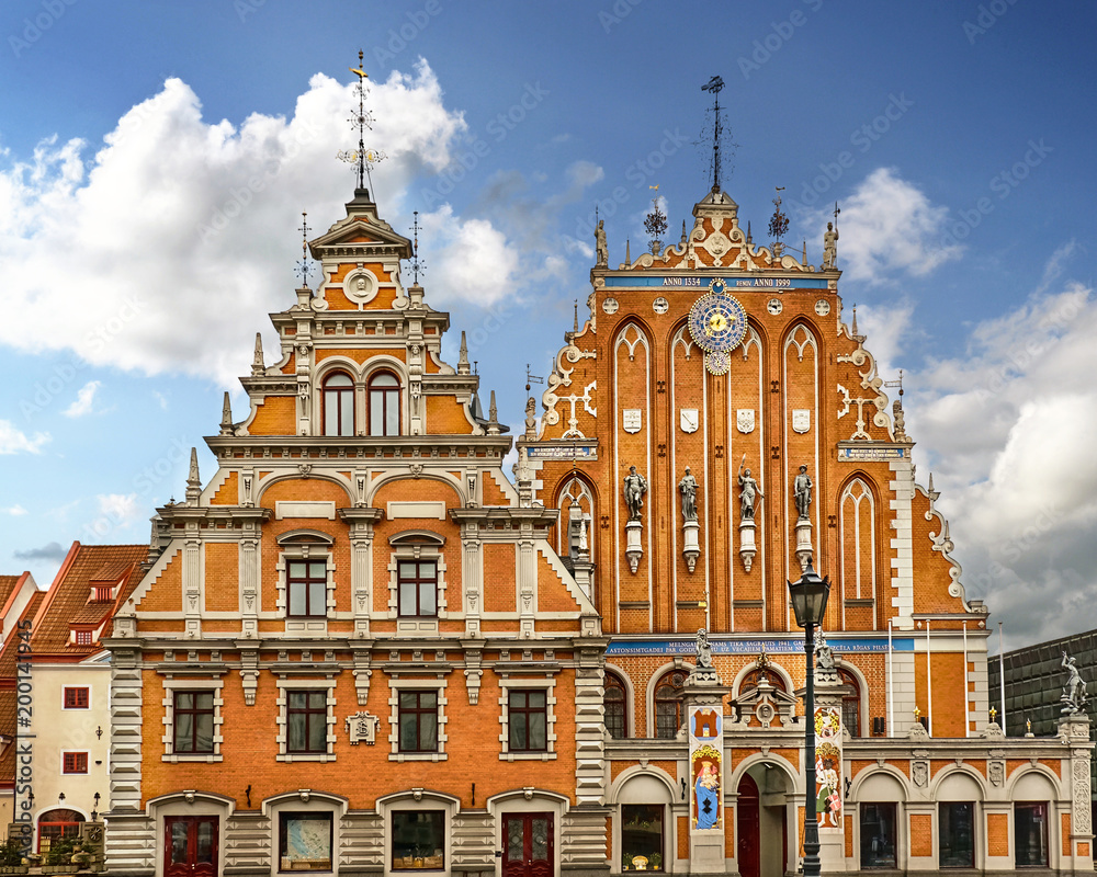 Riga, Latvia. Schwabe House And House Of The Blackheads At Town Hall Square, Ancient Historical Landmark And Popular Touristic place In bright summer day