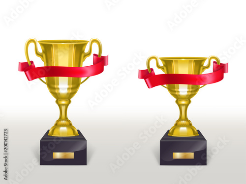 Vector 3d realistic cup on pedestal with red ribbon, golden trophy on stand with stripe for winner of competition, championship. Shiny gold metal goblet. Reward, prize isolated on white background