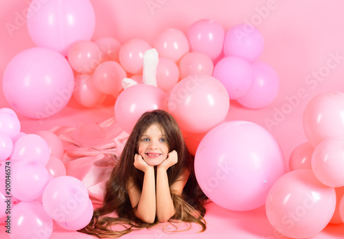 Kid in balloons, birthday.