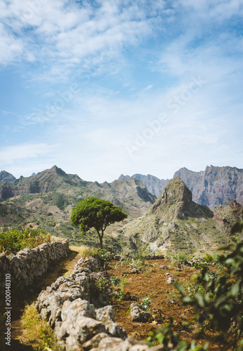 Hiking trail leading through arid rocky terrain towards Coculli village on Santo Antao Cape Verde