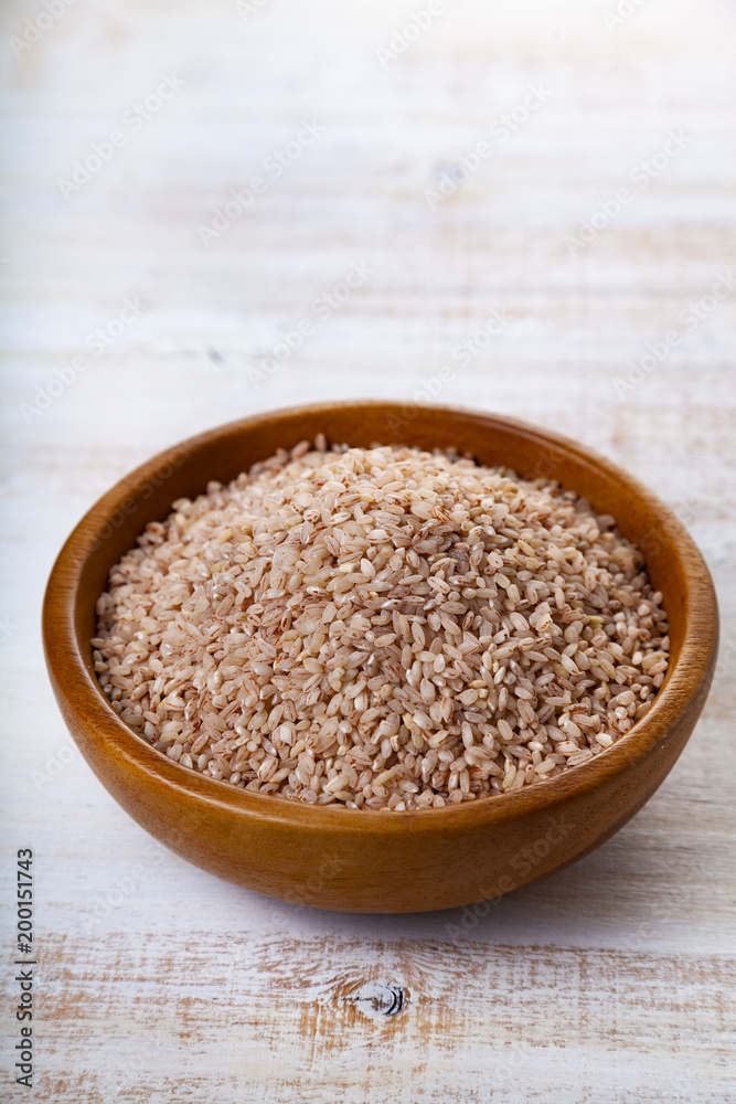 Raw pink rice in a bowl Raw pink rice in a bowl