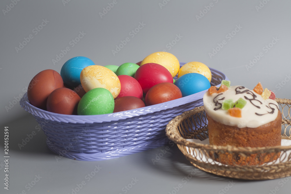 Fototapeta premium Easter cakes and colored eggs