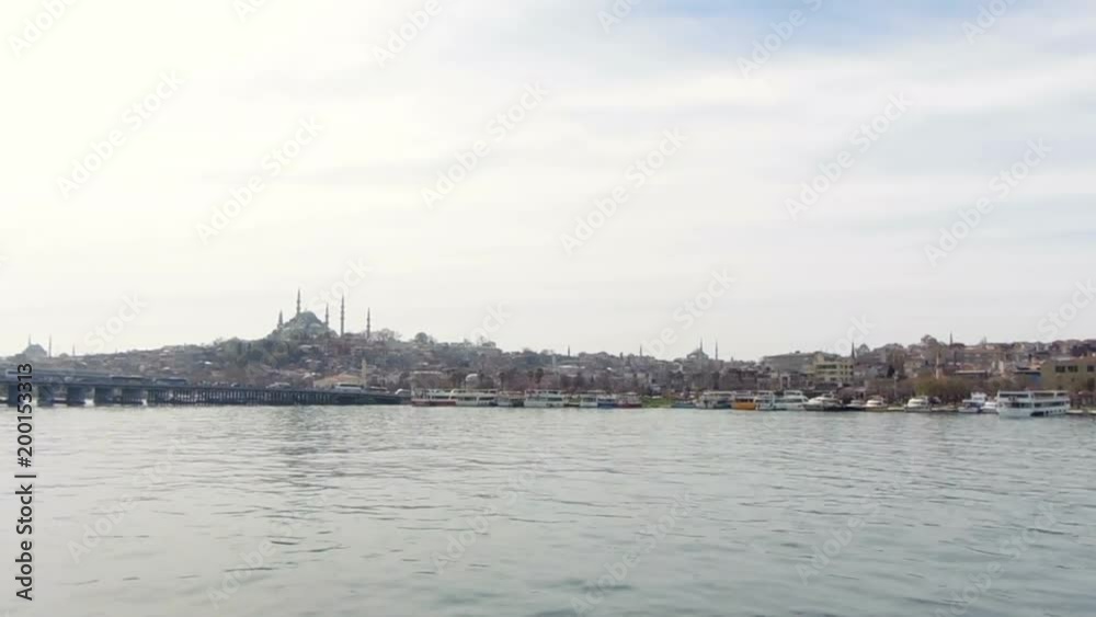 Panning shot. Beautiful view from sea large Muslim modern city. Seaport Istanbul. Cruising Bosphorus Panning shot. Beautiful view from sea large Muslim modern city. Seaport Istanbul. Cruising Bosphorus