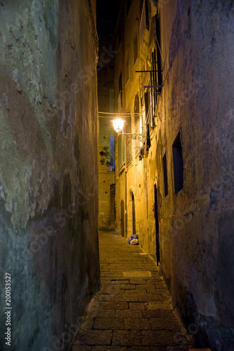 Narrow street in Tropea town at night © mkos83